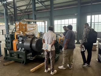 QINGDAO SHENGHUALONG RUBBER MACHINERY CO.,LTD